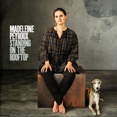 STANDING ON THE ROOFTOP