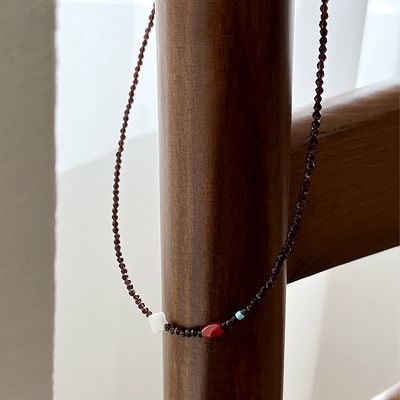 Clover with brown necklace