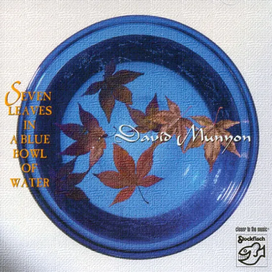 SEVEN LEAVES IN A BLUE BOWL OF WATER