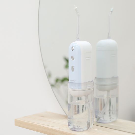 무아스 퓨어e쿨케어 UVC 살균 휴대용 구강세정기