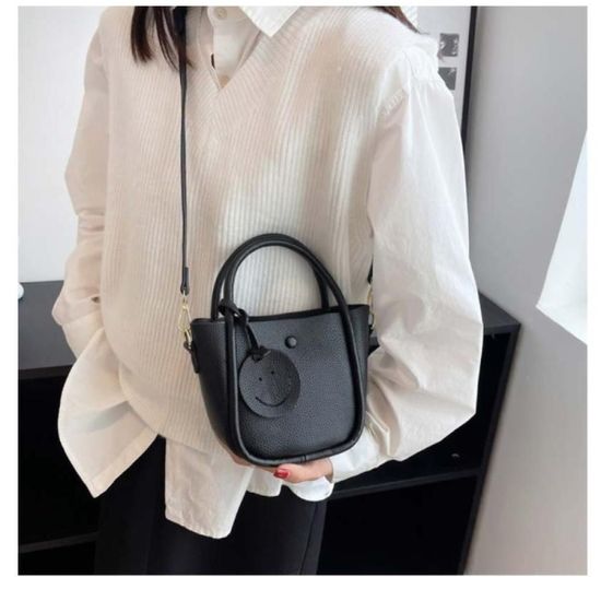 활동적인 캐주얼 복장 여성 단추빙그레 크로스백 잡화
