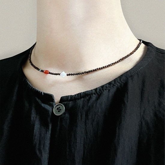 Clover with brown necklace