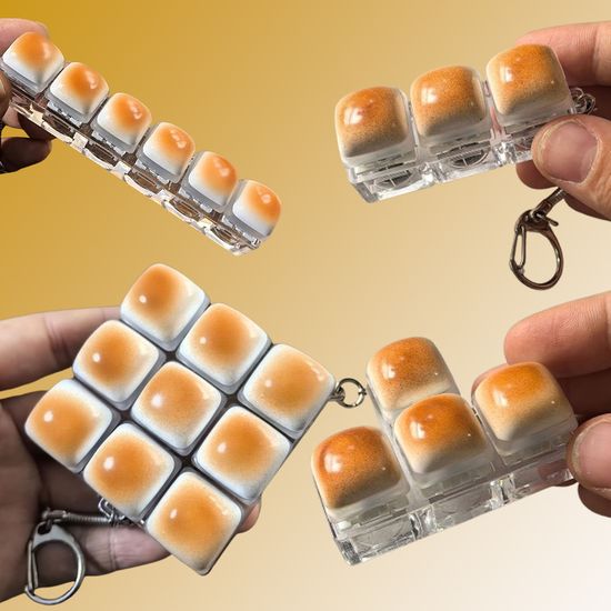 피젯 키보드 캐러멜빵 딸깍이 톡톡이 키캡 토이 키링