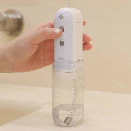 무아스 퓨어e쿨케어 UVC 살균 휴대용 구강세정기